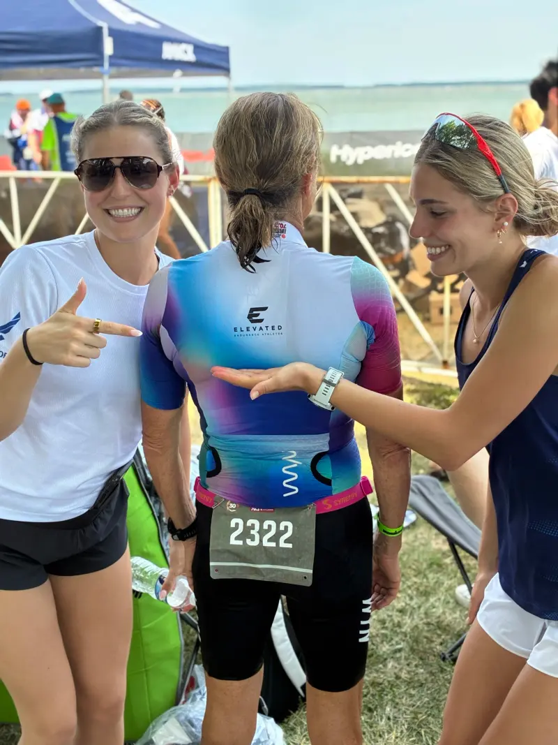 Athletes smiling together at a race