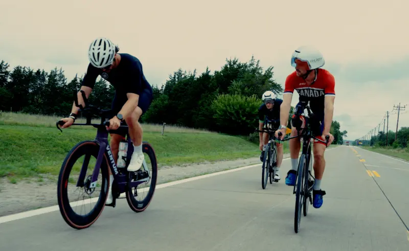 Cyclists riding on an open road