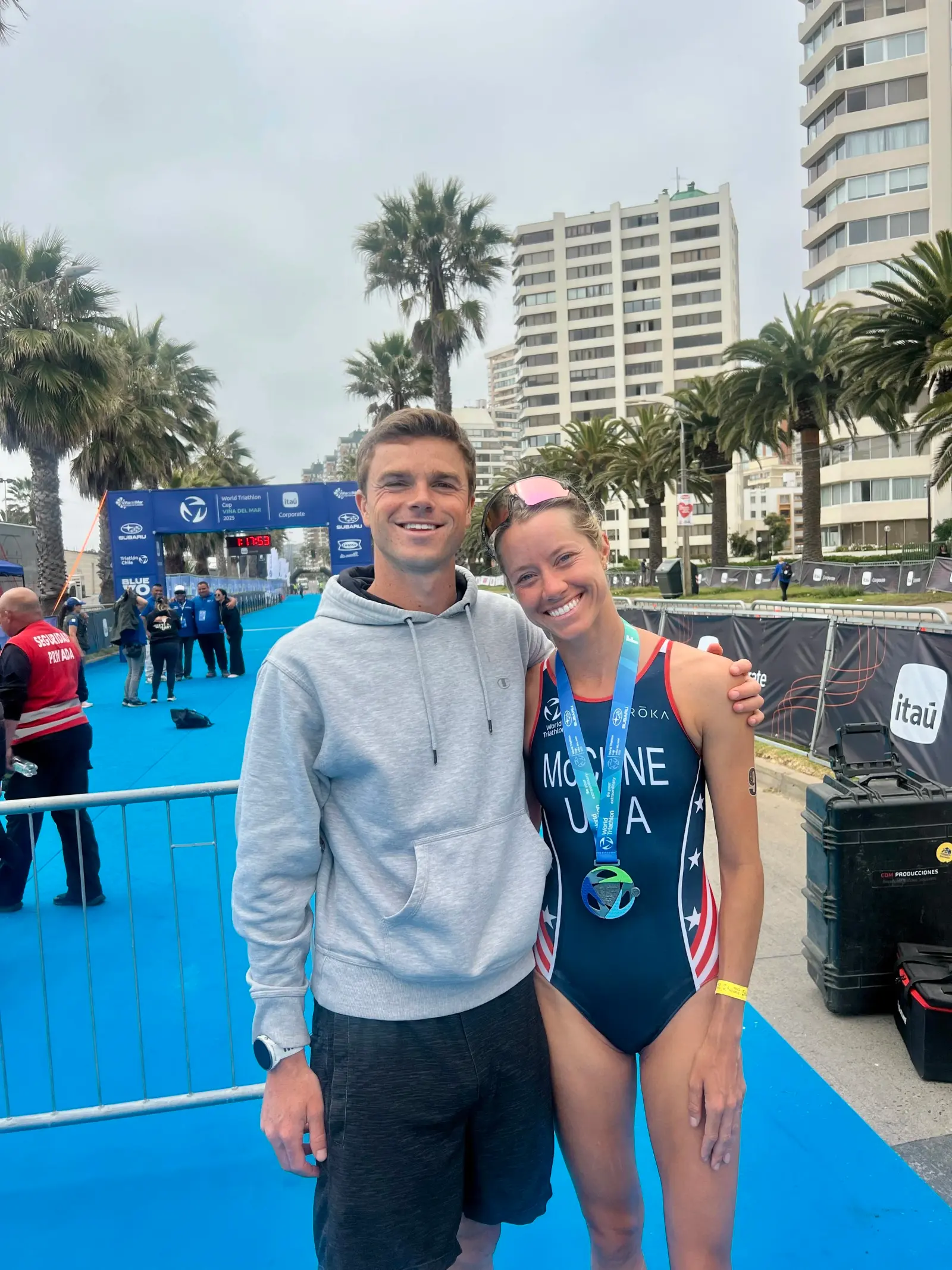 Coach Katie McCune with a teammate at a race venue