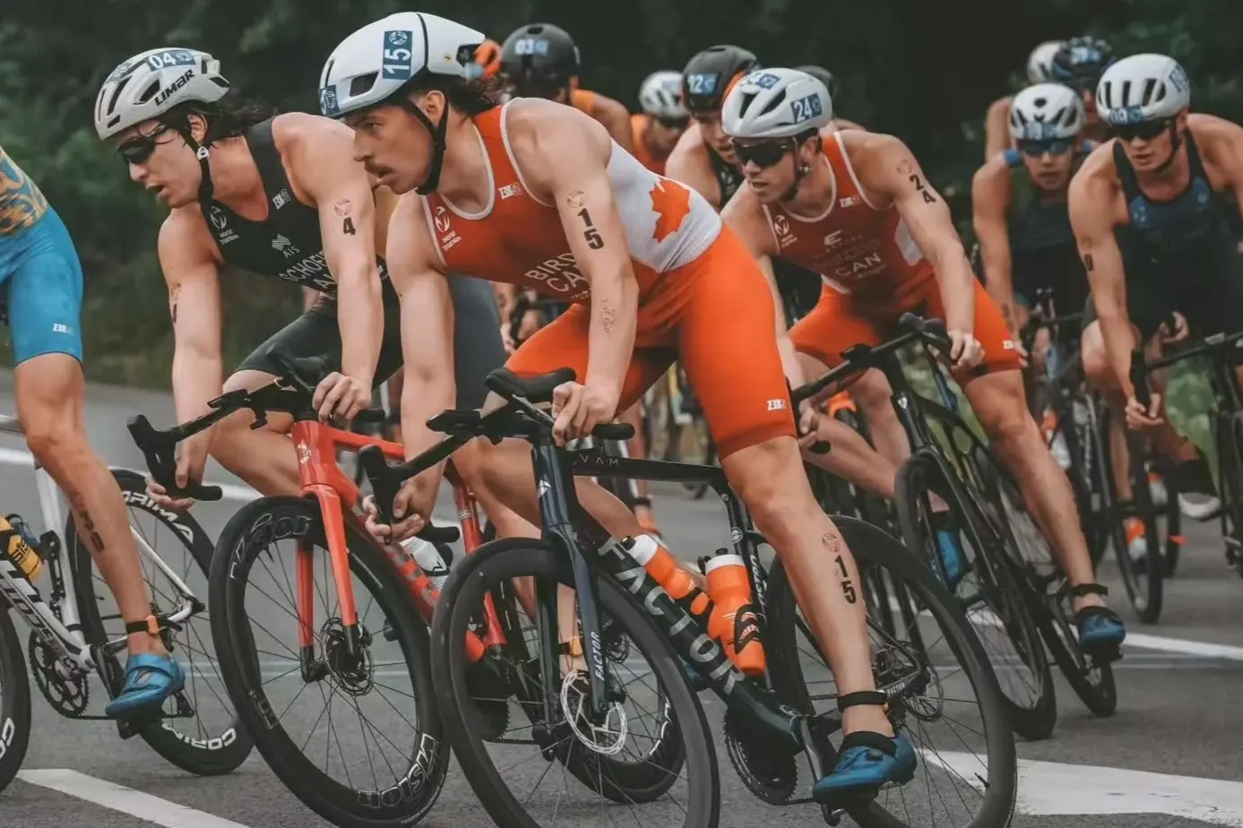 Triathletes racing in a draft-legal cycling pack